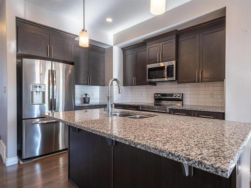 13829 138 Avenue, Edmonton, AB - Indoor Photo Showing Kitchen With Double Sink With Upgraded Kitchen