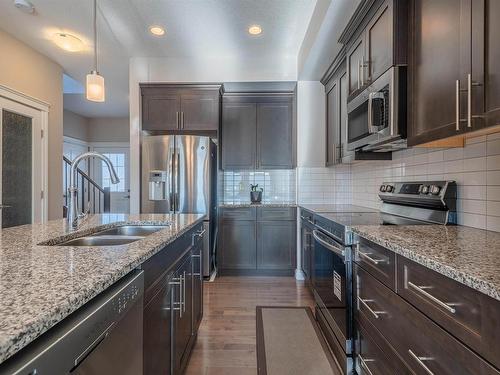 13829 138 Avenue, Edmonton, AB - Indoor Photo Showing Kitchen With Double Sink With Upgraded Kitchen