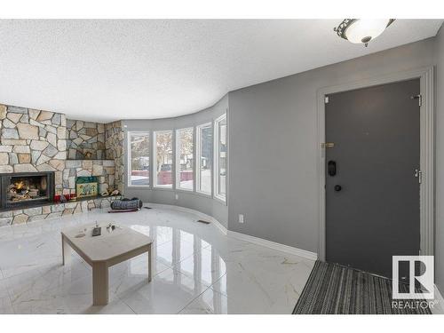 13220 42 Street, Edmonton, AB - Indoor Photo Showing Living Room With Fireplace