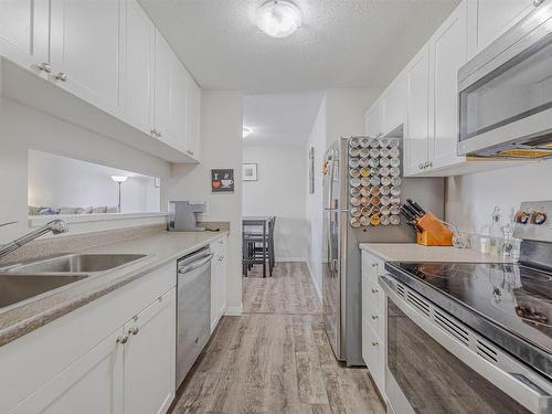 302 600 Kirkness Road, Edmonton, AB - Indoor Photo Showing Kitchen With Double Sink