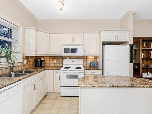 202 14205 96 Avenue, Edmonton, AB - Indoor Photo Showing Kitchen With Double Sink