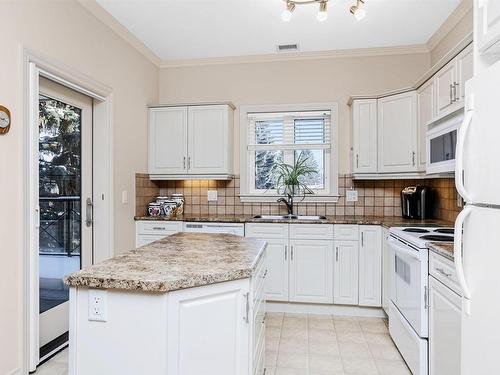 202 14205 96 Avenue, Edmonton, AB - Indoor Photo Showing Kitchen With Double Sink