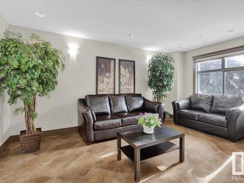 204 11615 Ellerslie Road, Edmonton, AB - Indoor Photo Showing Living Room