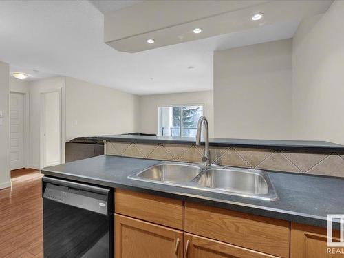 204 11615 Ellerslie Road, Edmonton, AB - Indoor Photo Showing Kitchen With Double Sink