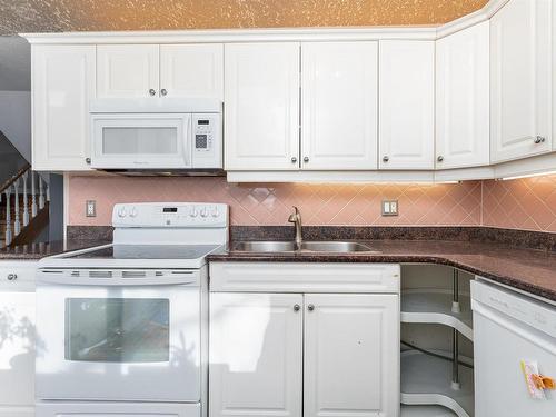 5216 146 Avenue, Edmonton, AB - Indoor Photo Showing Kitchen With Double Sink