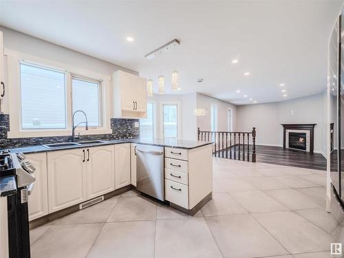 228 Whiston Road, Edmonton, AB - Indoor Photo Showing Kitchen With Double Sink With Upgraded Kitchen