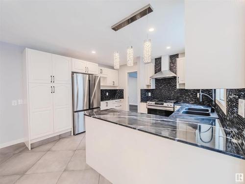 228 Whiston Road, Edmonton, AB - Indoor Photo Showing Kitchen With Double Sink