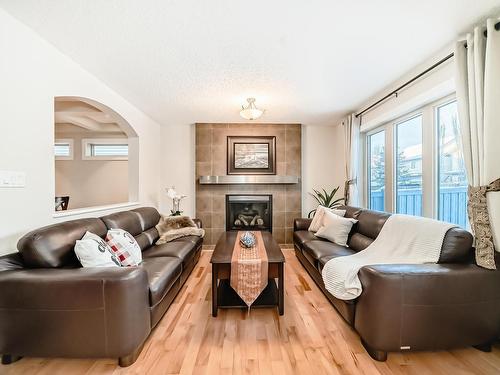 2674 Anderson Crescent, Edmonton, AB - Indoor Photo Showing Living Room With Fireplace