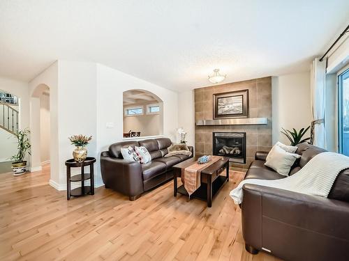 2674 Anderson Crescent, Edmonton, AB - Indoor Photo Showing Living Room With Fireplace