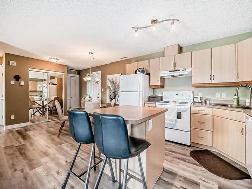 212 16303 95 Street, Edmonton, AB - Indoor Photo Showing Kitchen With Double Sink