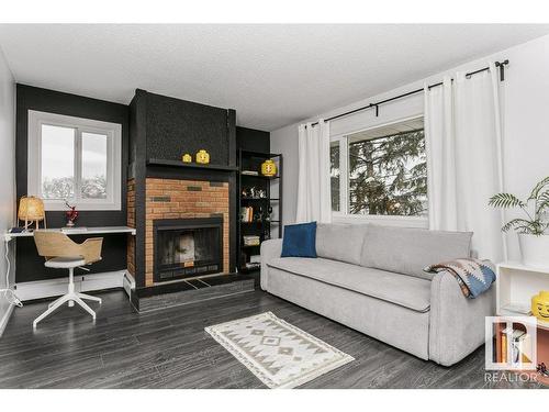 301 10826 113 Street, Edmonton, AB - Indoor Photo Showing Living Room With Fireplace