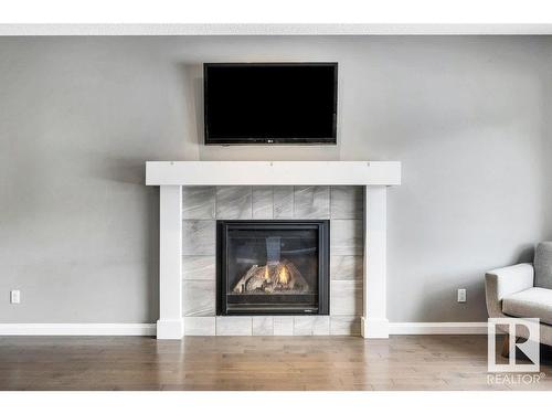 5363 Schonsee Drive, Edmonton, AB - Indoor Photo Showing Living Room With Fireplace