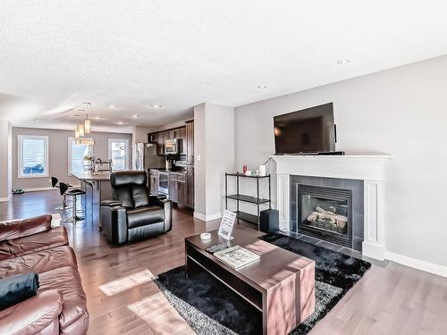 17804 6 Avenue, Edmonton, AB - Indoor Photo Showing Living Room With Fireplace