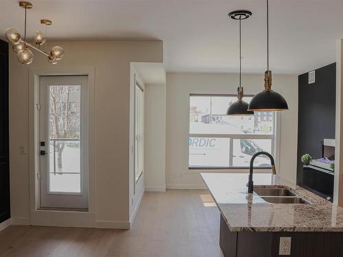 107 10523 123 Street, Edmonton, AB - Indoor Photo Showing Kitchen With Double Sink With Upgraded Kitchen