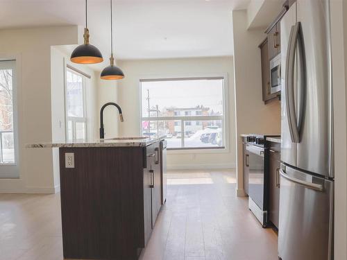 107 10523 123 Street, Edmonton, AB - Indoor Photo Showing Kitchen With Upgraded Kitchen