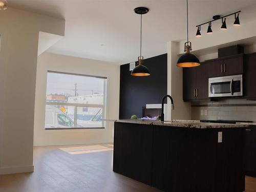 107 10523 123 Street, Edmonton, AB - Indoor Photo Showing Kitchen