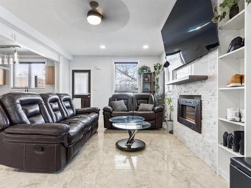 10922 96 Street, Edmonton, AB - Indoor Photo Showing Living Room With Fireplace