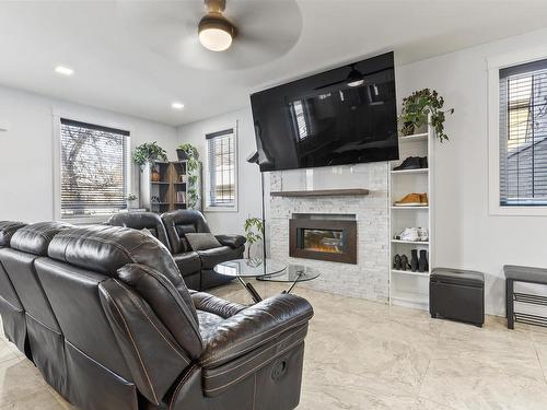 10922 96 Street, Edmonton, AB - Indoor Photo Showing Living Room With Fireplace