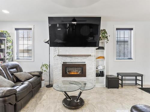 10922 96 Street, Edmonton, AB - Indoor Photo Showing Living Room With Fireplace