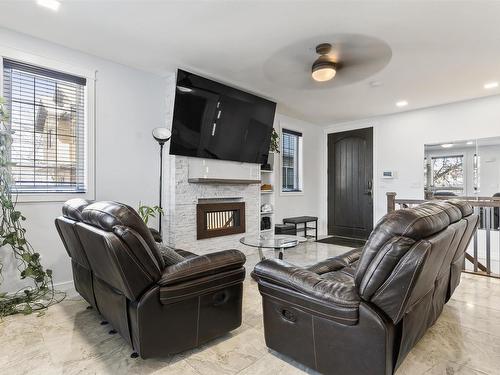 10922 96 Street, Edmonton, AB - Indoor Photo Showing Living Room With Fireplace