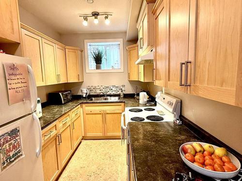 8114 79 Avenue, Edmonton, AB - Indoor Photo Showing Kitchen With Double Sink