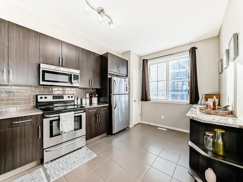 120 603 Watt Boulevard, Edmonton, AB - Indoor Photo Showing Kitchen With Stainless Steel Kitchen