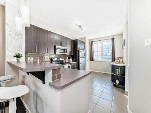 120 603 Watt Boulevard, Edmonton, AB - Indoor Photo Showing Kitchen With Stainless Steel Kitchen