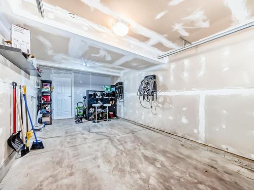 120 603 Watt Boulevard, Edmonton, AB - Indoor Photo Showing Garage