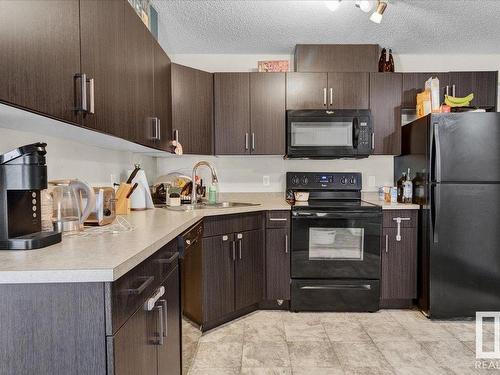 142 301 Clareview Station Drive, Edmonton, AB - Indoor Photo Showing Kitchen With Double Sink