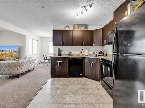 142 301 Clareview Station Drive, Edmonton, AB - Indoor Photo Showing Kitchen With Double Sink