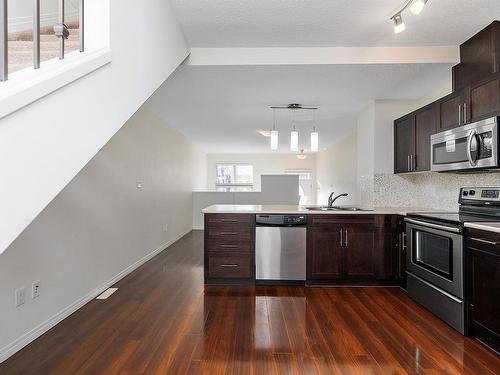 84 1623 Towne Centre Boulevard, Edmonton, AB - Indoor Photo Showing Kitchen With Double Sink