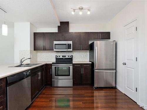 84 1623 Towne Centre Boulevard, Edmonton, AB - Indoor Photo Showing Kitchen With Double Sink