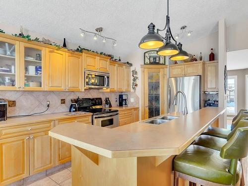 16127 76 Street, Edmonton, AB - Indoor Photo Showing Kitchen With Stainless Steel Kitchen With Double Sink