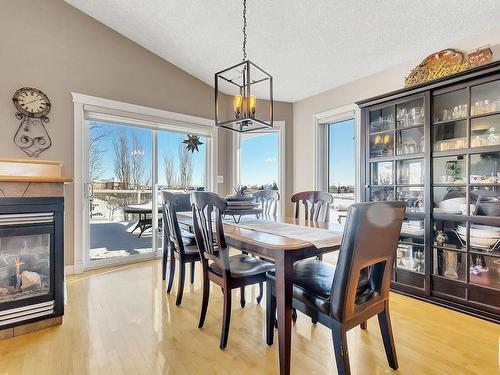 16127 76 Street, Edmonton, AB - Indoor Photo Showing Dining Room With Fireplace