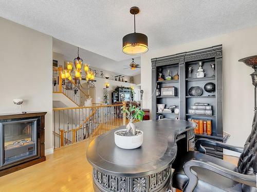 16127 76 Street, Edmonton, AB - Indoor Photo Showing Dining Room With Fireplace