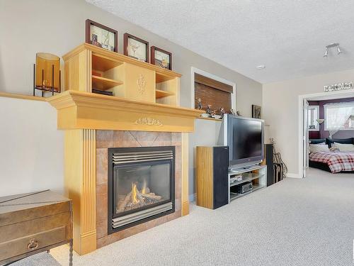 16127 76 Street, Edmonton, AB - Indoor Photo Showing Living Room With Fireplace