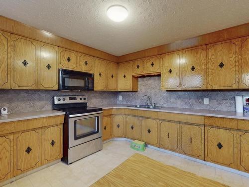 15004 88 Street, Edmonton, AB - Indoor Photo Showing Kitchen With Double Sink