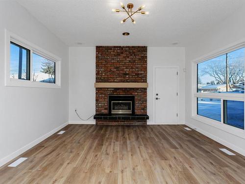 11332 57 Avenue, Edmonton, AB - Indoor Photo Showing Living Room With Fireplace