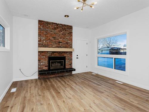 11332 57 Avenue, Edmonton, AB - Indoor Photo Showing Living Room With Fireplace