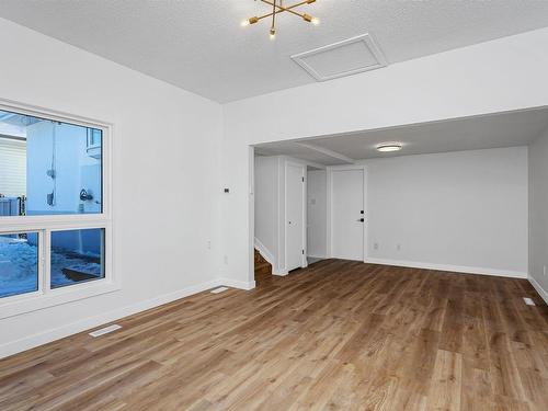 11332 57 Avenue, Edmonton, AB - Indoor Photo Showing Living Room With Fireplace