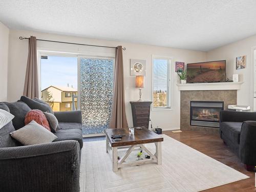 34 451 Hyndman Crescent, Edmonton, AB - Indoor Photo Showing Living Room With Fireplace