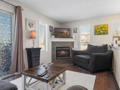 34 451 Hyndman Crescent, Edmonton, AB - Indoor Photo Showing Living Room With Fireplace