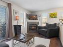 34 451 Hyndman Crescent, Edmonton, AB  - Indoor Photo Showing Living Room With Fireplace 