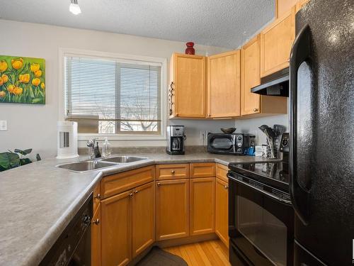 34 451 Hyndman Crescent, Edmonton, AB - Indoor Photo Showing Kitchen With Double Sink