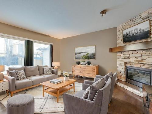 3007 Macneil Way, Edmonton, AB - Indoor Photo Showing Living Room With Fireplace