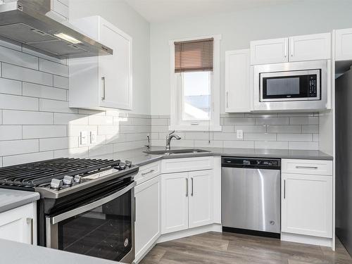 1435 167 Street, Edmonton, AB - Indoor Photo Showing Kitchen With Double Sink With Upgraded Kitchen