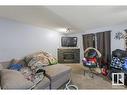 7931 7 Avenue, Edmonton, AB  - Indoor Photo Showing Living Room With Fireplace 