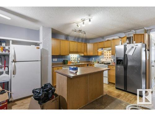 7931 7 Avenue, Edmonton, AB - Indoor Photo Showing Kitchen