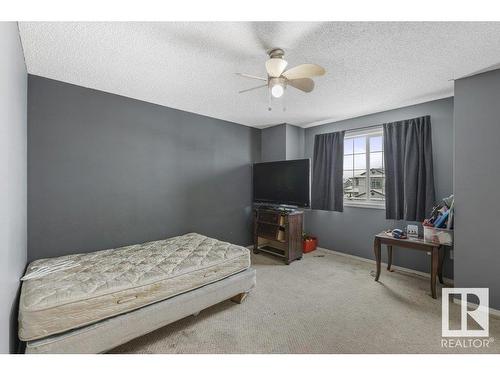 7931 7 Avenue, Edmonton, AB - Indoor Photo Showing Bedroom