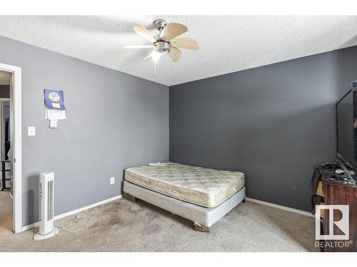 7931 7 Avenue, Edmonton, AB - Indoor Photo Showing Bedroom